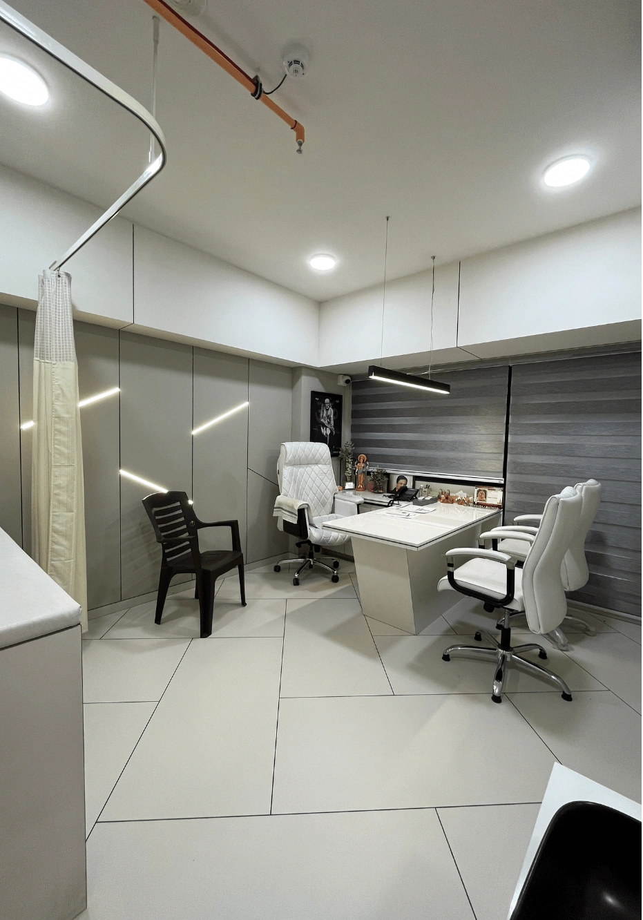 Consulting room with examination couch