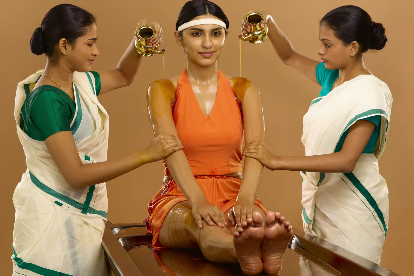 Warm oil poured over the whole body for deep restoration